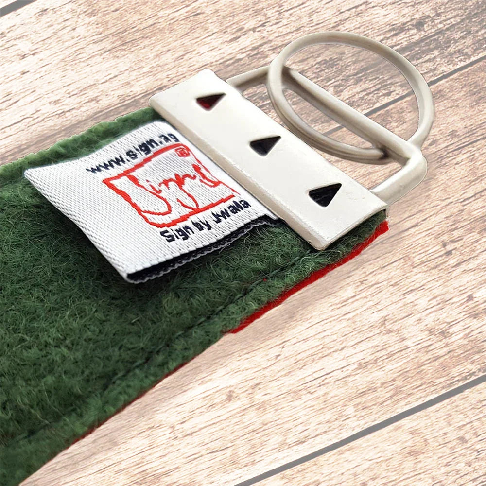 Exklusiver Wollwalk Schlüsselanhänger – Design-Taschenbaumler mit Botschaft
