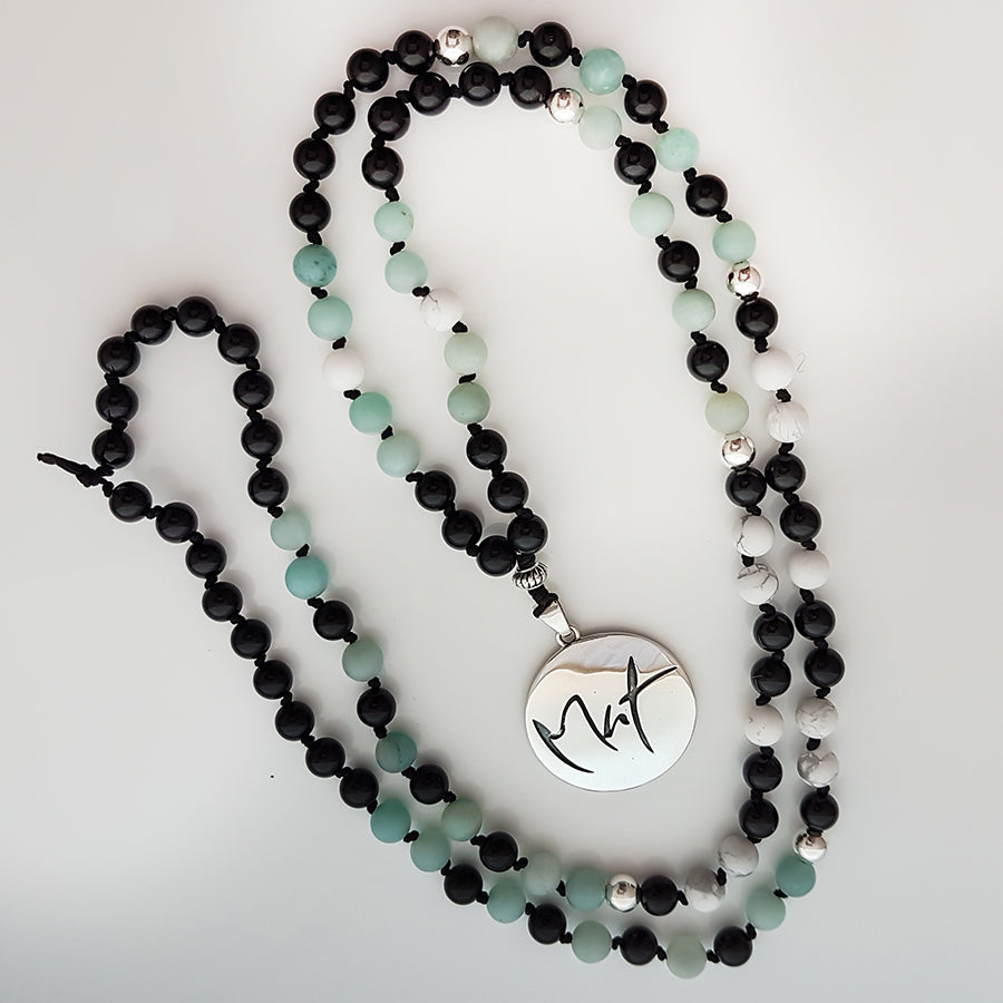 Spirituelle Mala Onyx Howlith Amazonit – Edelstein-Kette für innere Stärke online sichern