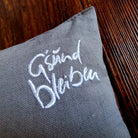 Kleines Zirbenkissen "G'sund bleiben" Grau