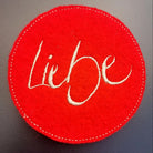 Edle Glasuntersetzer „Liebe“ in Rot – hochwertige Untersetzer für Wein- und Wassergläser