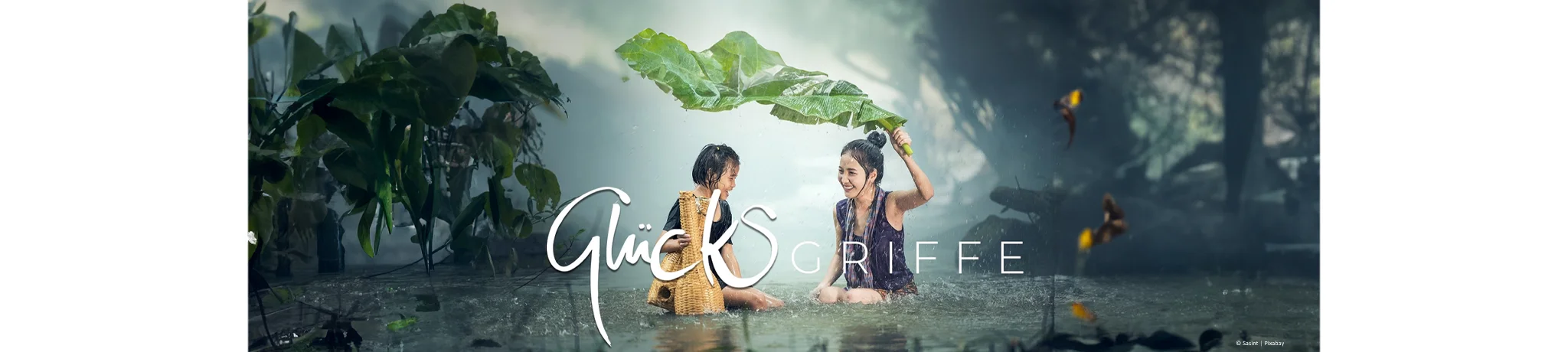 Das Bild zeigt eine Mutter mit Kind im Wasser.