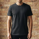 Schwarzes Herren-T-Shirt von Stanley/Stella aus bis zu 100 % gekämmter Bio-Baumwolle mit liebevoller spiritueller Botschaft