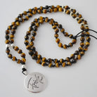 Exklusive Tigerauge-Mala „Friede“ – handgeknüpfte Meditationskette, Original von Sign by Jwala®, Limited Edition, hochwertiger Edelsteinschmuck für innere Stärke und Harmonie