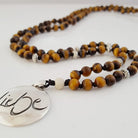 Premium Mala „Liebe“ Tigerauge – Sign by Jwala®, edle Handarbeit, Unikat, exklusives Schmuckstück für emotionale Heilung, Balance und spirituelle Entwicklung