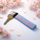 Exklusiver Schlüsselanhänger „Liebe ist der Schlüssel“ hellblau – hochwertiges Accessoire, handgefertigt aus Tirol, Original von Sign by Jwala®, Limited Edition, einzigartiges Geschenk
