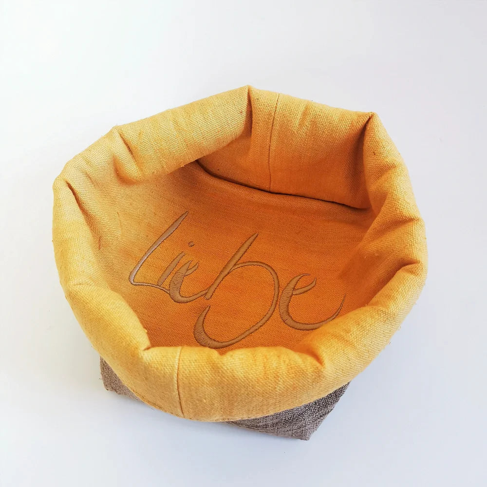 Natur Brotkorb „Liebe“ Gelb – Sign by Jwala®, nachhaltige Handarbeit aus Tirol, exklusives Küchenaccessoire, Unikat