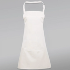 Weiße Latzschürze für Damen und Herren, flach präsentiert vor grauem Hintergrund – perfekt zum Personalisieren mit einer Jwala® Botschaft bei SignShop.tirol.