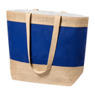 Perspektivische Ansicht der geräumigen Jute-Strandtasche in Blau mit Tragegriffen